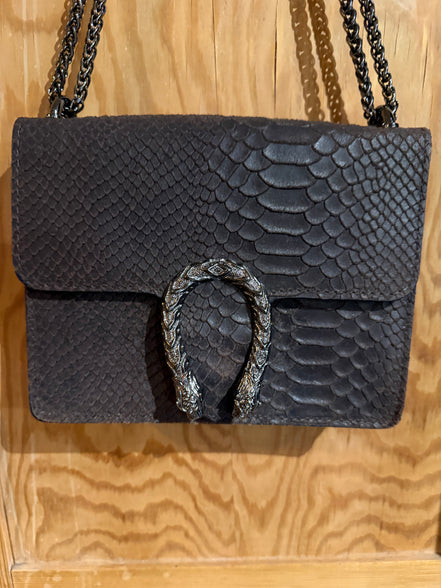 Elegante schoudertas met slangenstructuur