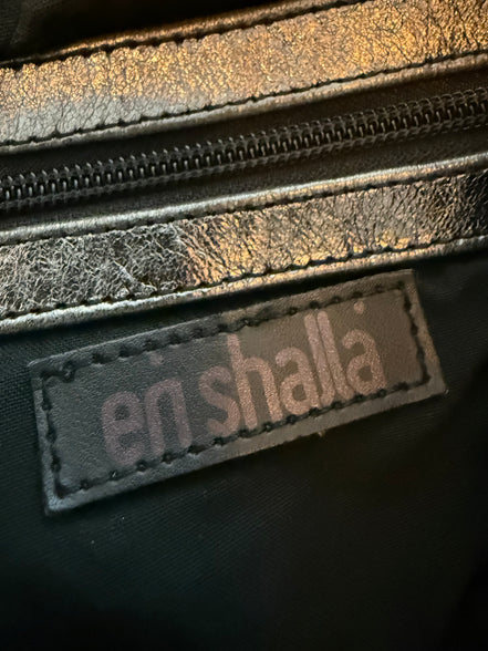 En Shalla tas