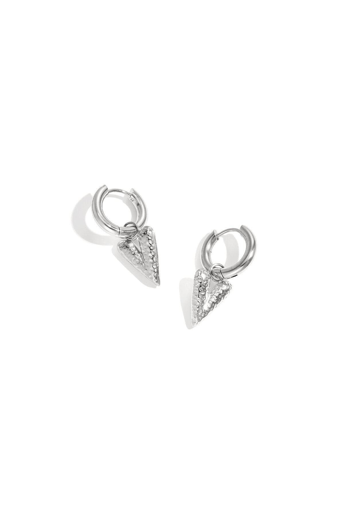 Earrings with structured hanging heart