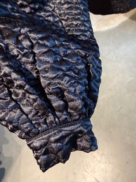 NA-KD top maat 38 – mouwdetail