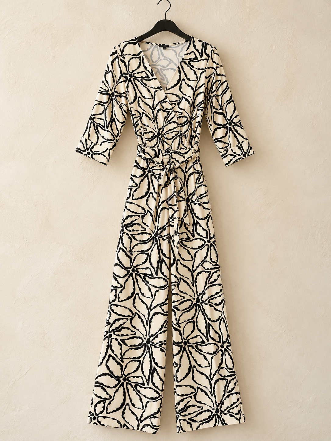 Smashed Lemon crème-zwarte jumpsuit met bloemenprint maat 38